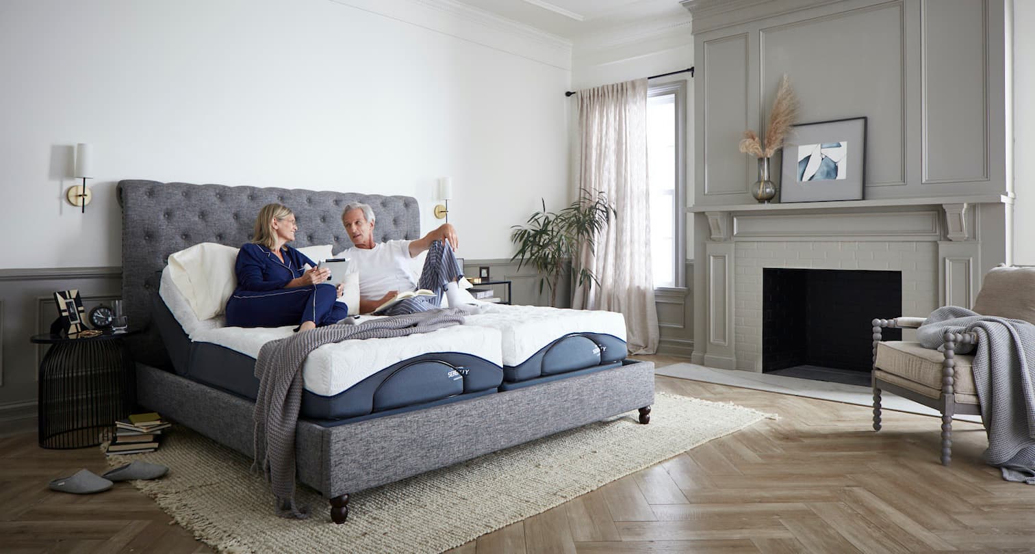 Couple laying in OMF Adjustable Bed