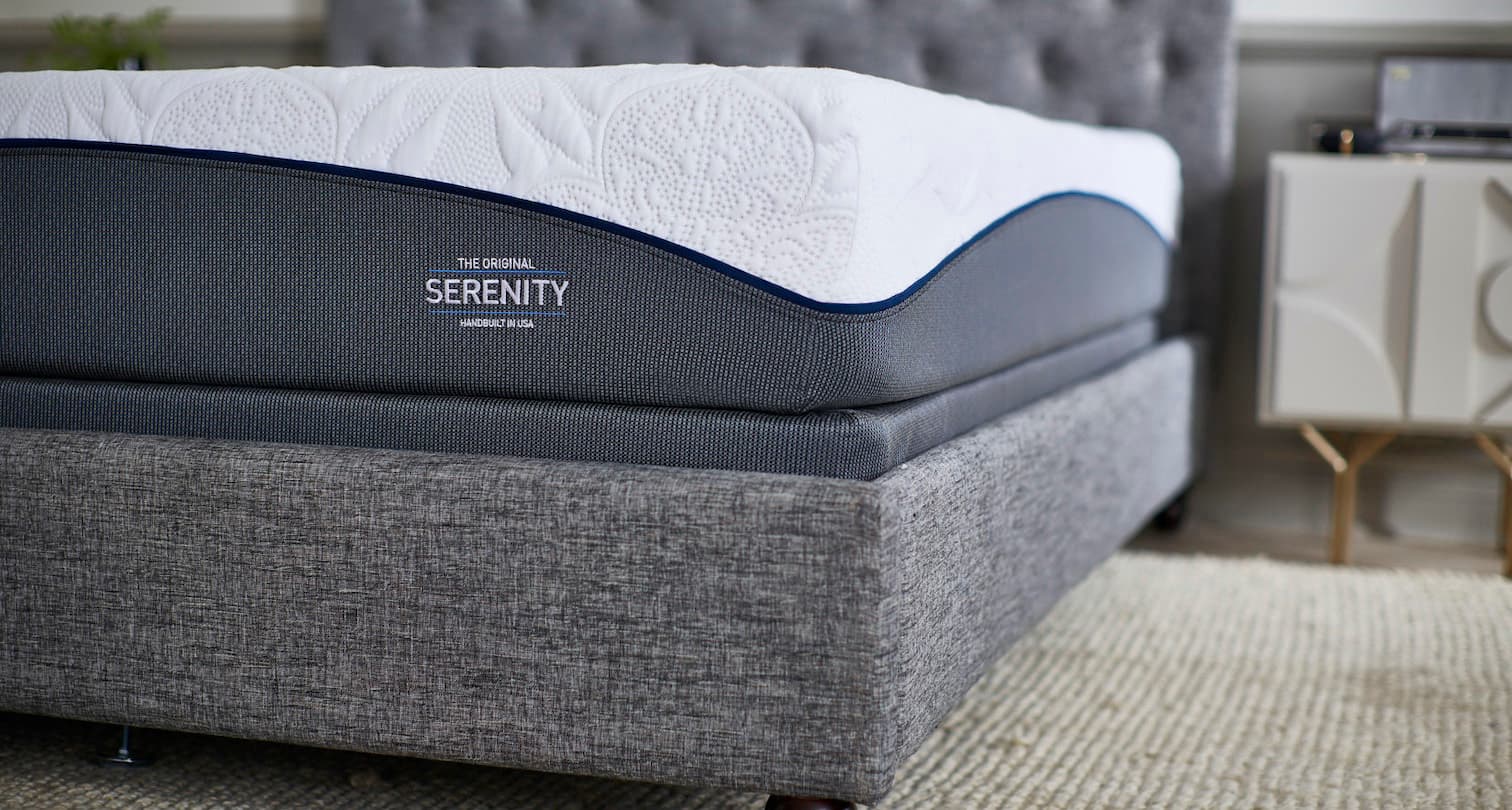 Couple laying in OMF Serenity Bed
